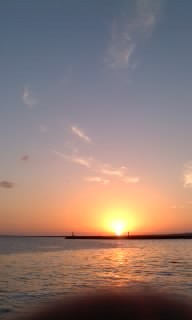 石垣島浜崎町と小浜島細崎からの夕日
